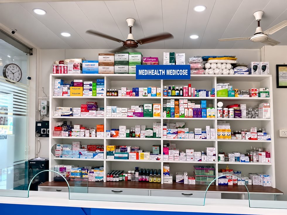 Medihealth Medicose in-house pharmacy counter with stocked medicine shelves